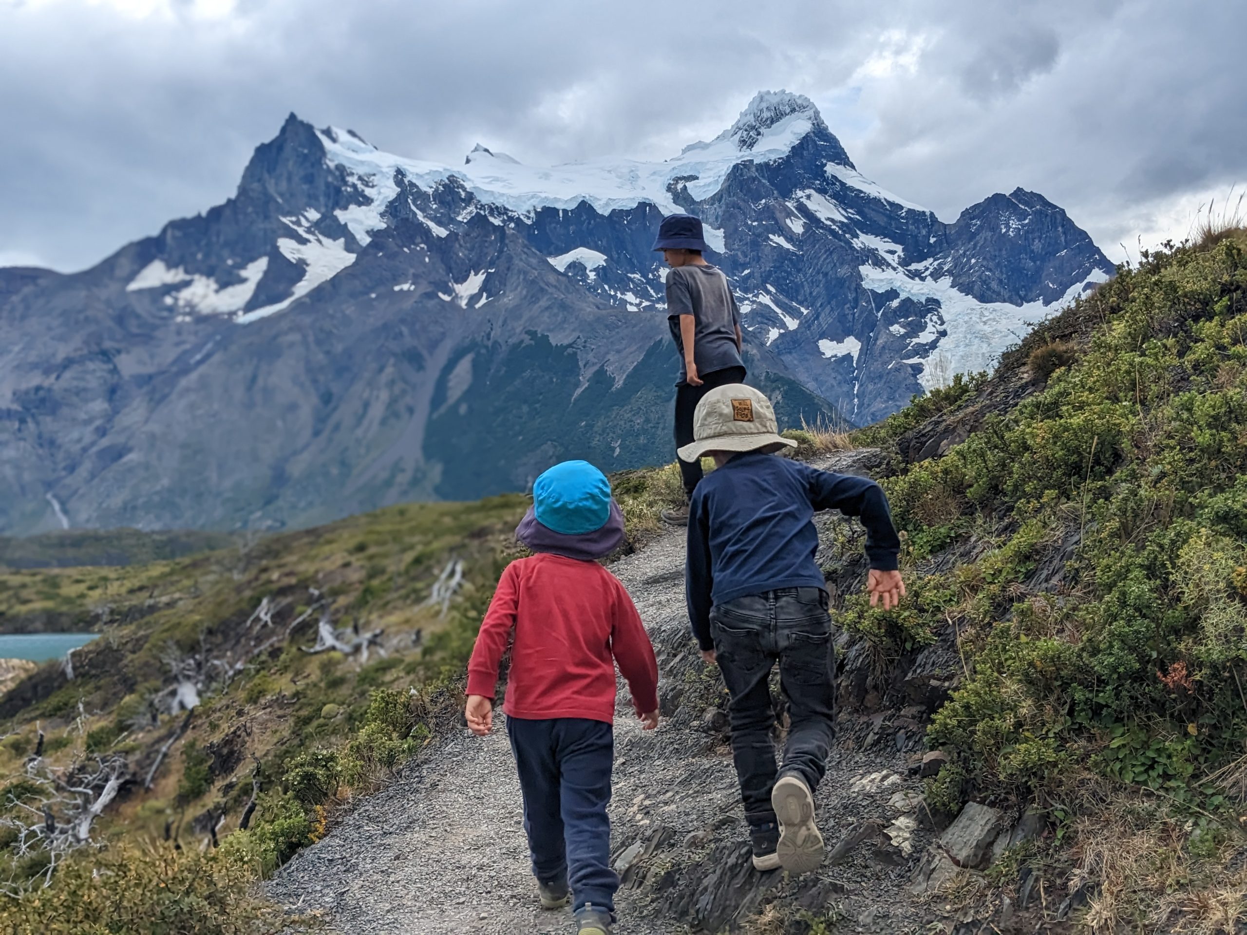 Kids hiking a mountain